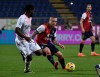 Radja Nainggolan of Cagliari, right, in action against Milan, during their Italian Serie A soccer match between Cagliari and Milan at the Sardegna Arena stadium in Cagliari, Italy, Monday, Jan. 18, 2021. (Alessandro Tocco/LaPresse via AP)