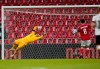 Danish keeper is unable to save a shot as Belgium's Dries Mertens takes the score to 0-2, during their Nations League Group Stage soccer match at Parken Stadium in Copenhagen, Denmark, Saturday Sept. 5, 2020. (Liselotte Sabroe/Ritzau Scanpix via AP)