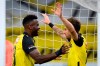 Young Boys' Miralem Sulejmani, right, celebrates his goal, bringing the score to 2-0, against Klaksvik, during their Champions League second round qualification soccer match between Switzerland's BSC Young Boys and Faerie's KI Klaksvik at the Wankdorf stadium in Bern, Switzerland, Wednesday, Aug. 26, 2020. (Anthony Anex/Keystone via AP)