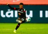 Bayer Leverkusen's Demarai Gray scores their fifth goal against Stuttgart during their German Bundesliga soccer match at BayArena in Leverkusen, Germany, Saturday Feb. 6, 2021. (Thilo Schmuelgen/Pool via AP)