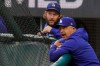 Los Angeles Dodgers manager Dave Roberts and starting pitcher Clayton Kershaw watch batting practice before Game 2 of the baseball World Series against the Tampa Bay Rays Wednesday, Oct. 21, 2020, in Arlington, Texas. (AP Photo/Sue Ogrocki)