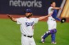 Los Angeles Dodgers starting pitcher Clayton Kershaw warms up before Game 1 of the baseball World Series against the Tampa Bay Rays Tuesday, Oct. 20, 2020, in Arlington, Texas. (AP Photo/Eric Gay)