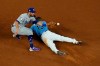 Tampa Bay Rays' Manuel Margot steals second past Los Angeles Dodgers second baseman Chris Taylor during the fourth inning in Game 5 of the baseball World Series Sunday, Oct. 25, 2020, in Arlington, Texas. (AP Photo/David J. Phillip)