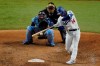 Los Angeles Dodgers' Enrique Hernandez hits a RBI-single against the Tampa Bay Rays during the fifth inning in Game 1 of the baseball World Series Tuesday, Oct. 20, 2020, in Arlington, Texas. (AP Photo/Sue Ogrocki)