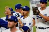 Los Angeles Dodgers right fielder Mookie Betts celebrates their win against the Tampa Bay Rays in Game 1 of the baseball World Series Tuesday, Oct. 20, 2020, in Arlington, Texas. The Dodgers defeated the Rays 8-3 to lead the series 1-0 games. (AP Photo/Eric Gay)