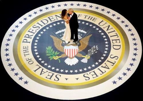 FILE - In this Jan. 20, 2017, file photo, President Donald Trump dances with first lady Melania Trump at The Salute To Our Armed Services Inaugural Ball. (AP Photo/Evan Vucci, File)
