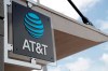 FILE - In this July 18, 2019, file photo, a sign is displayed at an AT&T retail store in Miami. Corporations have given more than $50 million in recent years to state lawmakers who have seized on Donald Trump’s lies about a stolen 2020 election to push for new restrictions on the right to vote. That's according to a new report by the government watchdog nonprofit Public Citizen. Telecom-giant AT&T was the most prolific giver, donating over $800,000 since 2015 to authors of proposed restrictions, co-sponsors of such measures, or those who voted in favor of the bills, a new report by the Washington-based non-profit Public Citizen found. (AP Photo/Lynne Sladky, File)