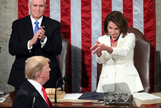 FILE - In this Feb. 5, 2019 file photo, President Donald Trump turns to House Speaker Nancy Pelosi of Calif., as he delivers his State of the Union address to a joint session of Congress on Capitol Hill in Washington, as Vice President Mike Pence watches. (AP Photo/Andrew Harnik)