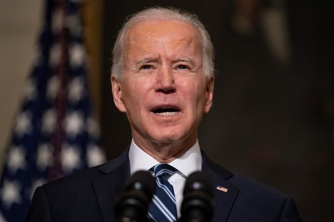 In this Jan. 27, 2021, photo, President Joe Biden speaks in the State Dining Room of the White House in Washington. Biden’s $1.9 trillion COVID-19 relief package presents a first political test. More than a sweeping rescue plan, it's a test of the strength of his new administration, of Democratic control of Congress and of the role of Republicans in a post-Trump political landscape. (AP Photo/Evan Vucci)