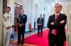 FILE - In this May 22, 2019, file photo, White House Counsel Pat Cipollone, right, attends a Public Safety Officer Medal of Valor presentation ceremony in the East Room of the White House in Washington. President Donald Trump is turning to an unassuming jurist with little trial experience but high regard in conservative Washington legal circles to lead his defense in his impeachment trial. Cipollone has spent most of his career in commercial litigation.(AP Photo/Andrew Harnik, File)
