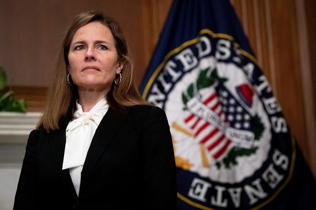 Supreme Court nominee Judge Amy Coney Barrett, meets with Sen. Joni Ernst, R-Iowa, not shown, Thursday, Oct. 1, 2020, at the Capitol in Washington. (Caroline Brehman/Pool via AP)