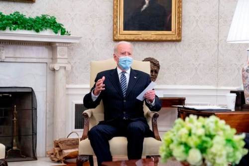 In this April 19, 2021, photo, President Joe Biden speaks in the Oval Office of the White House in Washington. (AP Photo/Andrew Harnik)