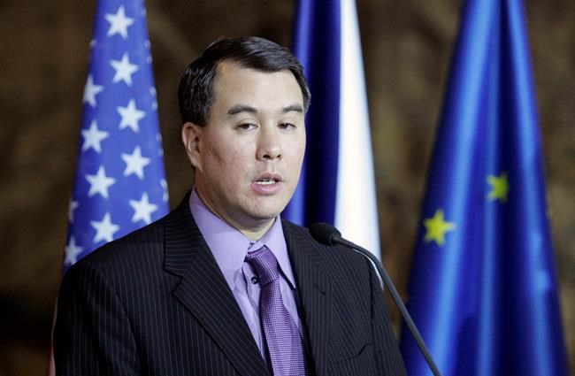 FILE - In this Feb. 7, 2008. file photo, John Rood, then U.S. Under Secretary for Arms Control and International Security, answers questions from the media during a press conference at the Cernin's Palace in Prague, Czech Republic. Rood, a senior Defense Department official who spoke in favor of providing aid to Ukraine is resigning. (AP Photo/Petr David Josek, File)