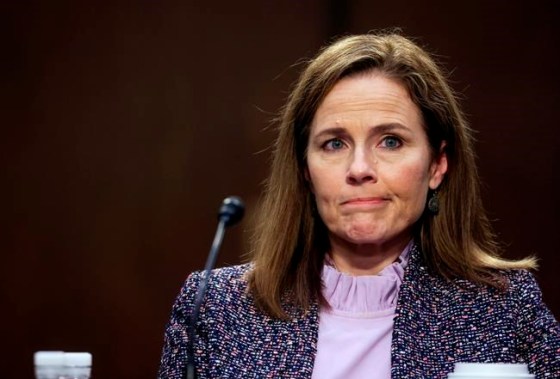 Supreme Court nominee Amy Coney Barrett departs with her husband, Jesse, after the third day of her confirmation hearings before the Senate Judiciary Committee on Capitol Hill in Washington, Wednesday, Oct. 14, 2020. (Jonathan Ernst/Pool via AP)