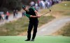 International team player Abraham Ancer of Mexico plays his second shot on the 6th hole in his singles match during the President's Cup golf tournament at Royal Melbourne Golf Club in Melbourne, Sunday, Dec. 15, 2019. (AP Photo/Andy Brownbill)
