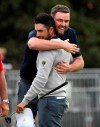 International team player Abraham Ancer of Mexico, left, and playing partner Marc Leishman of Australia celebrate on the 18th green after their foursome match during the President's Cup golf tournament at Royal Melbourne Golf Club in Melbourne, Saturday, Dec. 14, 2019. (AP Photo/Andy Brownbill)