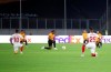 Sevilla and Wolverhampton Wanderers players observe a minute of silence prior to the stat of the Europa League quarterfinal soccer match between Wolves and Sevilla at the MSV Arena in Duisburg, Germany, Tuesday, Aug. 11, 2020. (Friedemann Vogel, Pool Photo via AP)