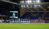 Everton and West Ham players commemorates COVID-19 victims during the English Premier League soccer match between Everton and West Ham at Goodison Park in Liverpool, England, Friday, Jan. 1, 2021. (Jan Kruger,Pool via AP)