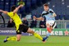 Dortmund's Thomas Delaney, left, challenges for the ball with Lazio's Ciro Immobile during the Champions League group F soccer match between Lazio and Borussia Dortmund at the Olympic stadium in Rome, Tuesday, Oct. 20, 2020. (AP Photo/Gregorio Borgia)