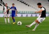 Juventus' Cristiano Ronaldo makes a penalty attempt during the Serie A soccer match between Juventus and Sampdoria at the Allianz stadium, in Turin, Italy, Sunday, July 26, 2020. (AP Photo/Antonio Calanni)