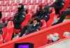Liverpool's Mohamed Salah sits on the bench during the English Premier League soccer match between Liverpool and Chelsea at Anfield stadium in Liverpool, England, Thursday, March 4, 2021. (Laurence Griffiths, Pool via AP)