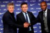 Soccer coach Quique Setien poses with FC Barcelona's President Josep Maria Bartomeu, center, and director of football Eric Abidal, right, while being officially introduced as the club's new coach at the Camp Nou stadium in Barcelona, Spain, Tuesday, Jan. 14, 2020. Barcelona made a rare coaching change midway through the season, replacing Ernesto Valverde with former Real Betis manager Quique Setien on Monday. (AP Photo/Emilio Morenatti)