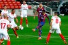 Barcelona's Ousmane Dembele, 2nd right, attempts a shot at goal during the the Copa del Rey semifinal, second leg, soccer match between FC Barcelona and Sevilla FC at the Camp Nou stadium in Barcelona, Spain, Wednesday March 3, 2021. (AP Photo/Joan Monfort)