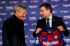 Soccer coach Quique Setien smiles with FC Barcelona's President Josep Maria Bartomeu, right, while being officially introduced as the club's new coach at the Camp Nou stadium in Barcelona, Spain, Tuesday, Jan. 14, 2020. Barcelona made a rare coaching change midway through the season, replacing Ernesto Valverde with former Real Betis manager Quique Setien on Monday. (AP Photo/Emilio Morenatti)