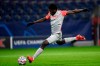 Salzburg's Sekou Koita attempts a shot at goal during the Champions League group A soccer match between RB Salzburg and Atletico Madrid in Salzburg, Austria, Wednesday, Dec. 9, 2020. (AP Photo/Andreas Schaad)