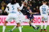 PSG's Angel Di Maria, center, scores the opening goal during the League One soccer match between Paris Saint Germain and Lyon at the Parc des Princes stadium in Paris, Sunday, Feb. 9, 2020. (AP Photo/Thibault Camus)