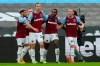 West Ham's Michail Antonio, 2nd right, celebrates after scoring the opening goal during the English Premier League soccer match between West Ham United and Burnley, at London stadium, in London, Saturday, Jan. 16, 2021. (Catherine Ivill/Pool via AP)