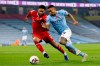 Liverpool's Joe Gomez vies for the ball with Manchester City's Gabriel Jesus, right, during the English Premier League soccer match between Manchester City and Liverpool at the Etihad stadium in Manchester, England, Sunday, Nov. 8, 2020. (Clive Brunskill/Pool via AP)