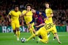 Barcelona's Lionel Messi drives the ball past Dortmund's Lukasz Piszczek, right, during a Champions League group F soccer match between Barcelona and Dortmund at the Camp Nou stadium in Barcelona, Spain, Wednesday, Nov. 27, 2019. (AP Photo/Emilio Morenatti)