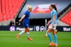 Chelsea's Millie Bright, left, celebrates after scoring the opening goal during the English FA Women's Community Shield soccer match between Chelsea and Manchester City at Wembley stadium in London, Saturday, Aug. 29, 2020. (Justin Tallis/Pool via AP)