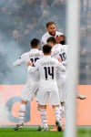 PSG's Kylian Mbappe, right, celebrates after scoring his side's fourth goal during the Champions League group A soccer match between PSG and Galatasaray at the Parc des Princes stadium in Paris, Wednesday, Dec. 11, 2019. (AP Photo/Christophe Ena)