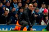 Manchester City's head coach Pep Guardiola reacts after a missed chance to score during the English League Cup semifinal second leg soccer match between Manchester City and Manchester United at Etihad stadium in Manchester, England, Wednesday, Jan. 29, 2020. (AP Photo/Dave Thompson)