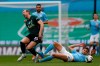 Tottenham's Harry Kane reacts after a tackle from Manchester City's Ruben Dias, on the ground, during the English League Cup final soccer match between Manchester City and Tottenham Hotspur at Wembley stadium in London, Sunday, April 25, 2021. (AP Photo/Alastair Grant)