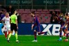 Barcelona's Gerard Pique, center, celebrates after scoring his side's second goal during the the Copa del Rey semifinal, second leg, soccer match between FC Barcelona and Sevilla FC at the Camp Nou stadium in Barcelona, Spain, Wednesday March 3, 2021. (AP Photo/Joan Monfort)