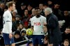 Tottenham's manager Jose Mourinho talks with Tottenham's Serge Aurier, center, during the English Premier League soccer match between Tottenham Hotspur and Liverpool at the Tottenham Hotspur Stadium in London, England, Saturday, Jan. 11, 2020. (AP Photo/Matt Dunham)