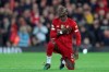 Liverpool's Sadio Mane celebrates after scoring the opening goal during the English Premier League soccer match between Liverpool and Wolverhampton Wanderers at Anfield Stadium, Liverpool, England, Sunday Dec. 29, 2019. (AP Photo/Jon Super)