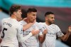 Manchester City's Rodrigo, center, celebrates after scoring his side's second goal during the English Premier League soccer match between Aston Villa and Manchester City at Villa Park Stadium in Birmingham, England, Wednesday, April 21, 2021. (Carl Recine/Pool via AP)