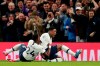 Tottenham's Steven Bergwijn, right, celebrates with Serge Aurier after scoring the opening goal during the English Premier League soccer match between Tottenham Hotspur and Manchester City at the Tottenham Hotspur Stadium in London, England, Sunday, Feb. 2, 2020. (AP Photo/Ian Walton)