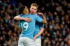 Manchester City's Gabriel Jesus, left, celebrates with Kevin De Bruyne after scoring his side's third goal during the English Premier League soccer match between Manchester City and Leicester City at Etihad stadium in Manchester, England, Saturday, Dec. 21, 2019. (AP Photo/Rui Vieira)