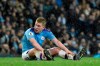 Manchester City's Kevin De Bruyne sits on the pitch before being substituted in the last minutes of the English Premier League soccer match between Manchester City and Leicester City at Etihad stadium in Manchester, England, Saturday, Dec. 21, 2019. (AP Photo/Rui Vieira)