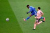 Leicester's Kelechi Iheanacho scores his side's third goal next to Sheffield United's Kean Bryan, right, during the English Premier League soccer match between Leicester City and Sheffield United at the King Power Stadium in Leicester, England, Sunday, March 14, 2021. (Alex Pantling/Pool via AP)