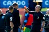 Referee Mike Dean shows a red card to West Bromwich Albion's manager Slaven Bilic during the English Premier League soccer match between Everton and West Bromwich Albion at Goodison Park in Liverpool, England Saturday, Sept. 19, 2020. (Alex Livesey/Pool via AP)