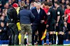 Everton's manager Carlo Ancelotti, center, reacts after being shown a red card by Referee Christopher Kavanagh during the English Premier League soccer match between Everton and Manchester United at Goodison Park in Liverpool, England, Sunday, March 1, 2020. (AP Photo/Jon Super)