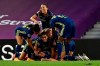 Lyon's Saki Kumagai, on the ground, celebrates after scoring her side's second goal during the Women's Champions League final soccer match between Wolfsburg and Lyon at the Anoeta stadium in San Sebastian, Spain, Sunday, Aug. 30, 2020. (AP PhotoAlvaro Barrientos, Pool)