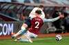 Aston Villa's Matty Cash fouls Manchester City's Phil Foden from behind during the English Premier League soccer match between Aston Villa and Manchester City at Villa Park Stadium in Birmingham, England, Wednesday, April 21, 2021. (Carl Recine/Pool via AP)