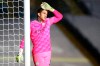 Manchester City's goalkeeper Ederson wipes his forehead during the English Premier League soccer match between Leeds United and Manchester City at Elland Road in Leeds, England, Saturday, Oct. 3, 2020. (Cath Ivill/Pool via AP)